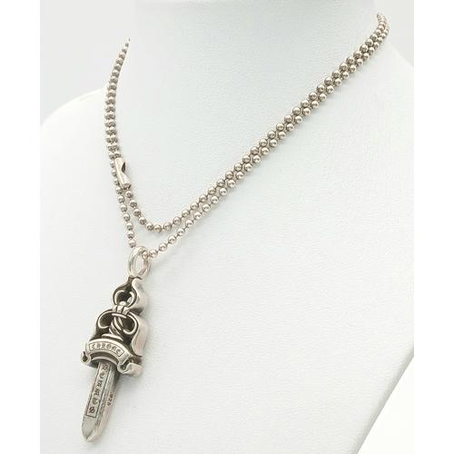 368 - A Designer Chrome Hearts Silver Dagger Necklace! 5cm dagger pendant. 58cm chain. 26g . Ref: 21186