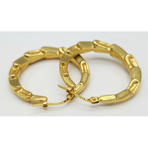 380 - A Pair of 9K Yellow Gold Creole Hoop Earrings. 3cm diameter.  2.8g