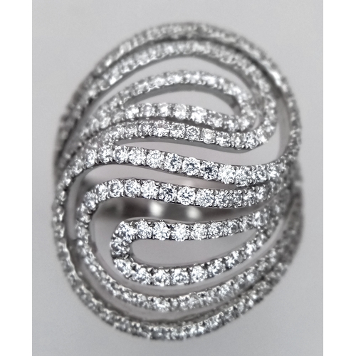 403 - A STUNNING 18K WHITE GOLD DIAMOND DESIGNER RING .     8.2gms    size s . Ref: 13348