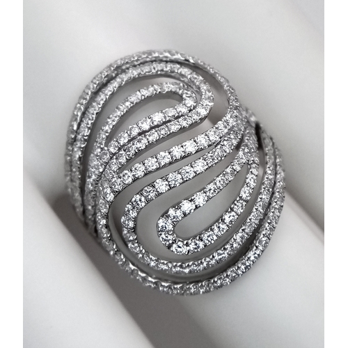 403 - A STUNNING 18K WHITE GOLD DIAMOND DESIGNER RING .     8.2gms    size s . Ref: 13348