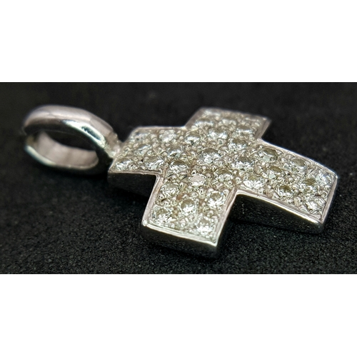 460 - AN 18K WHITE GOLD DIAMOND SET CROSS 0.40CT , 1.8G TOTAL WEIGHT, 1CM x 2CM. Ref: SC 4056