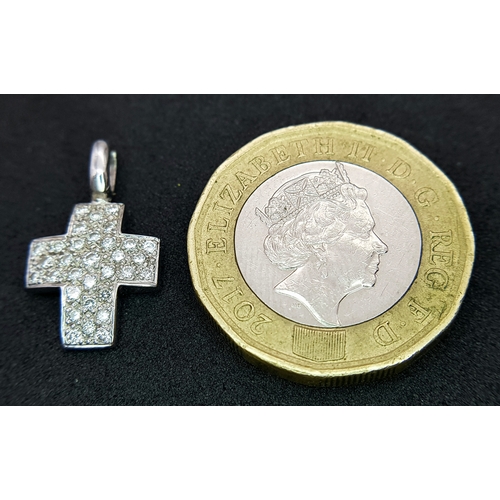 460 - AN 18K WHITE GOLD DIAMOND SET CROSS 0.40CT , 1.8G TOTAL WEIGHT, 1CM x 2CM. Ref: SC 4056