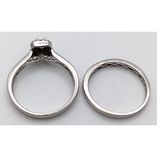 513 - Two Platinum Diamond Rings. A 0.77ctw two level size S and a diamond half eternity size S. 10.2g tot... 