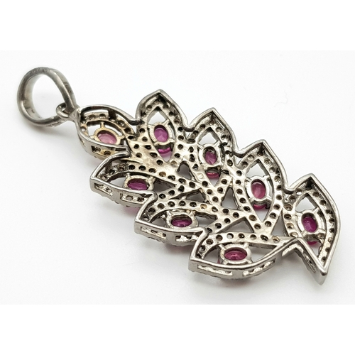 525 - A Beautiful Ruby and Diamond Decorative Floral Pendant - with 1.90ctw of Rubies and 1.60ctw of Diamo... 