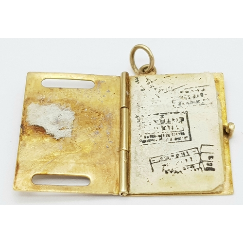 530 - A 9K YELLOW GOLD PASSPORT CHARM WHICH OPENS AND HAS THE STAMPED BOOK INSIDE 3G , 25MM X 15MM. Ref: S... 