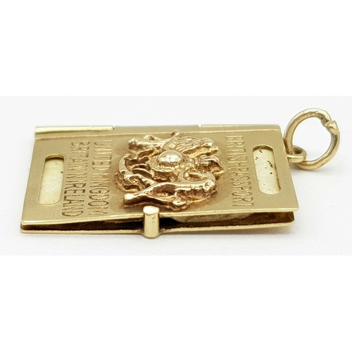 530 - A 9K YELLOW GOLD PASSPORT CHARM WHICH OPENS AND HAS THE STAMPED BOOK INSIDE 3G , 25MM X 15MM. Ref: S... 