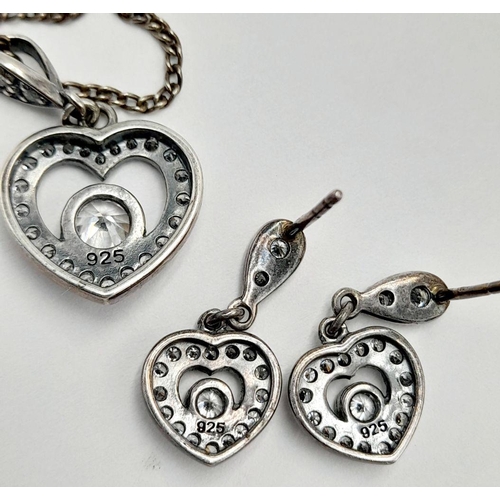 546 - A White Stones on Silver Heart Pendant, Earrings and Chain Necklace Set. Pendant - 2.5cm, earrings -... 