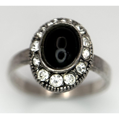 553 - A fancy 925 silver Onyx and Zirconia cluster ring. Total weight 3G. Size N/O.