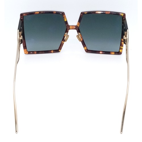 585 - A Pair of Designer Dior Sunglasses - with pouch. . Ref: 21138