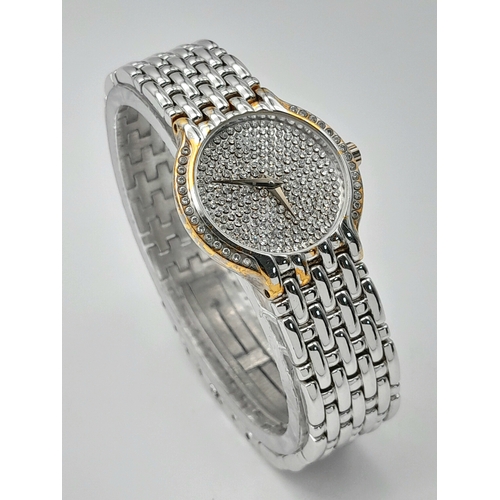 604 - A Raymond Weil Quartz Ladies Dress Watch. Stainless steel bracelet and case - 26mm. White stone encr... 