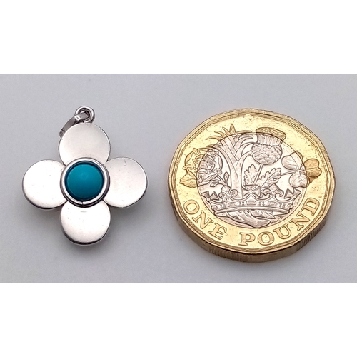 607 - A 14K WHITE GOLD TURQUOISE EVIL EYE SET CLOVER PENDANT. 2.1G TOTAL WEIGHT, 23MM X 16MM. Ref: SC 4033