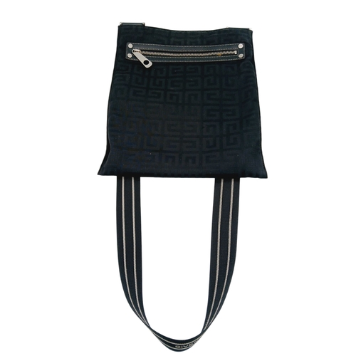 611 - A Givenchy Black Canvas Crossbody Bag. Black canvas exterior with silver-toned hardware, featuring a... 