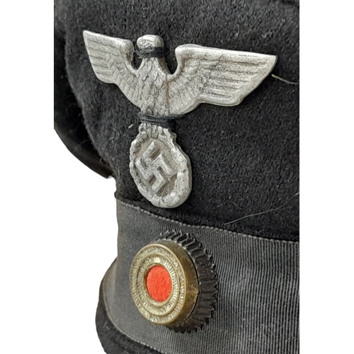 634 - A WW2 German Third Reich Railway Workers Cap with Visor.