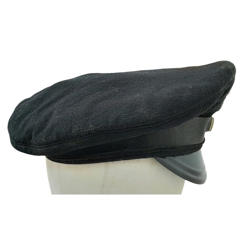 634 - A WW2 German Third Reich Railway Workers Cap with Visor.