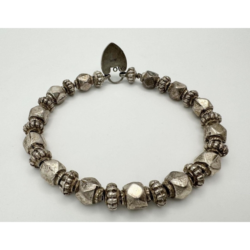 655 - A Vintage Silver Bauble Bracelet with Heart Clasp. 22cm. 36g