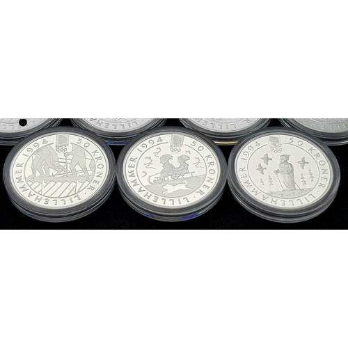 1759 - Ten Uncirculated Sterling Silver 1994 Winter Olympic, Lillehammer Commemorative Coins.  170g. In pla... 