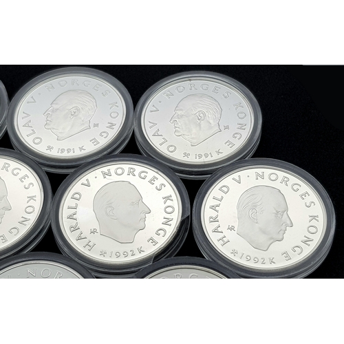 1759 - Ten Uncirculated Sterling Silver 1994 Winter Olympic, Lillehammer Commemorative Coins.  170g. In pla... 