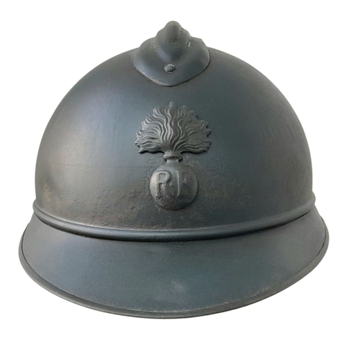 173 - A WW1 French Mle 15 Adriane Infantry Helmet with original liner and cap badge.