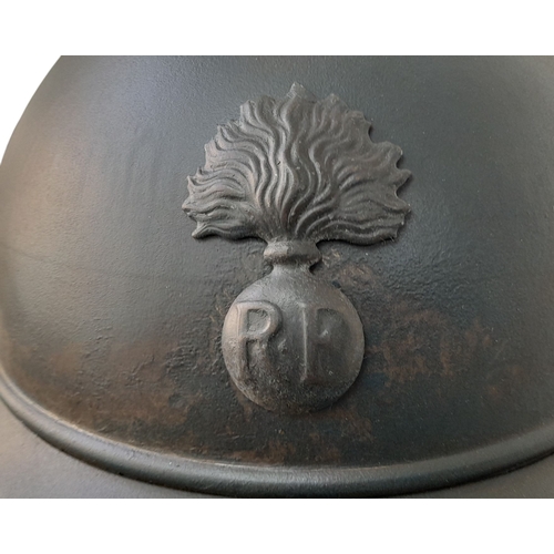 173 - A WW1 French Mle 15 Adriane Infantry Helmet with original liner and cap badge.