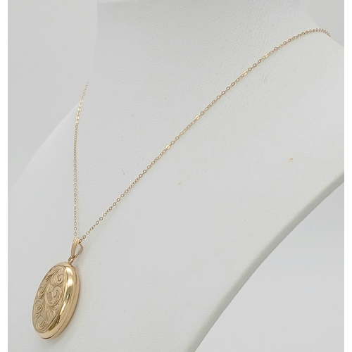 212 - A 9K YELLOW GOLD OVAL LOCKET ON 9K YELLOW GOLD TRACE CHAIN 5.1G TOTAL WEIGHT, 46CM LENGTH. REF: A/S ... 