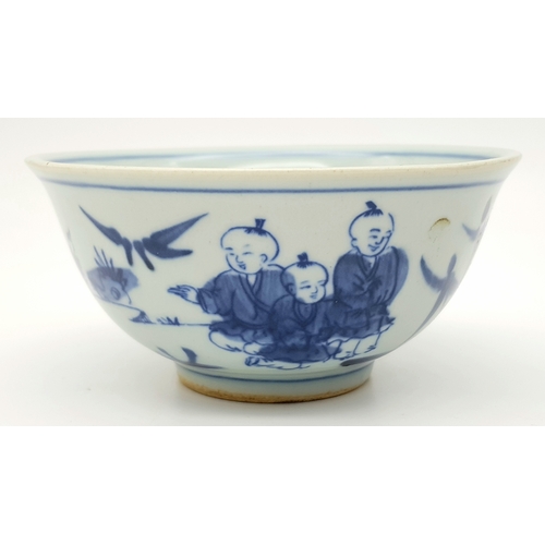 220 - A Chinese, blue and white hand painted bowl decorated with children playing with birds and signature... 