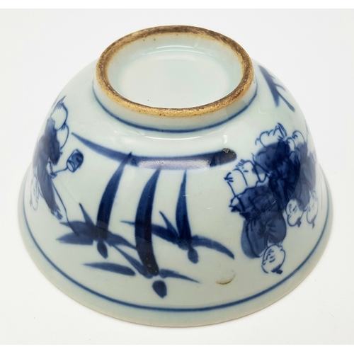 220 - A Chinese, blue and white hand painted bowl decorated with children playing with birds and signature... 