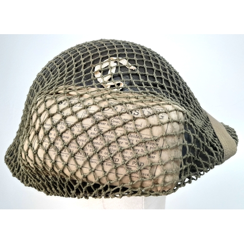 61 - A WW2 British Mk III 1944 “Turtle Pattern D-Day” Helmet. With the light blue Insignia of the Irish G... 