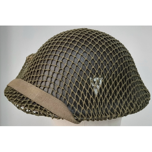 61 - A WW2 British Mk III 1944 “Turtle Pattern D-Day” Helmet. With the light blue Insignia of the Irish G... 