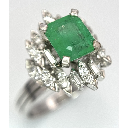 85 - A 14K WHITE GOLD DIAMOND & EMERALD RING 7.2G TOTAL WEIGHT, SIZE O 1/2. REF: TAN 5009 AS SIL