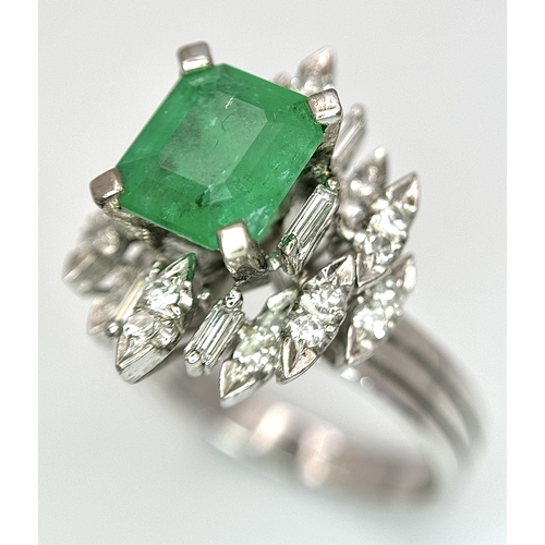 85 - A 14K WHITE GOLD DIAMOND & EMERALD RING 7.2G TOTAL WEIGHT, SIZE O 1/2. REF: TAN 5009 AS SIL