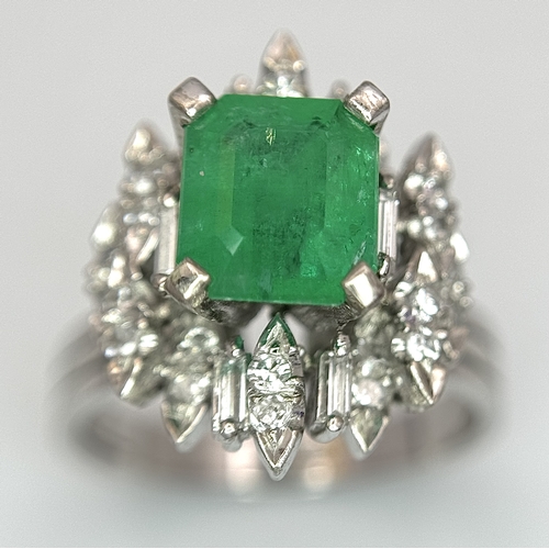 85 - A 14K WHITE GOLD DIAMOND & EMERALD RING 7.2G TOTAL WEIGHT, SIZE O 1/2. REF: TAN 5009 AS SIL