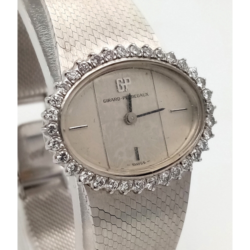 99 - A GIRARD PERREGAUX DIAMOND SET MANUAL WIND BRACELET WATCH. FULL WORKING ORDER AF 60% SILVER. REF: TA... 