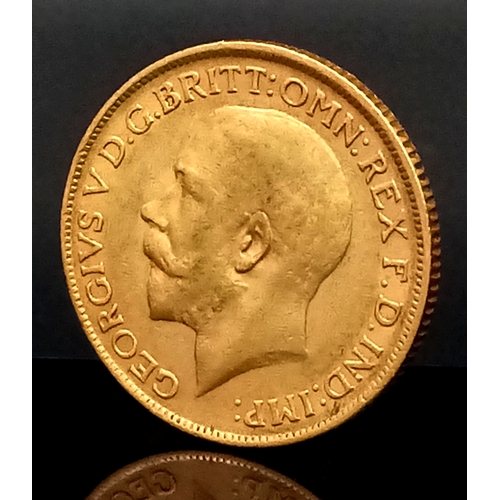 116 - A 1913 GEORGE V FULL SOVEREIGN COIN - 22K GOLD. C5007