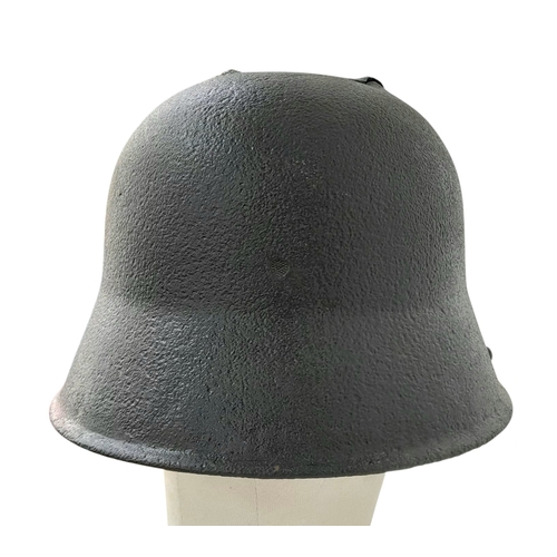 152 - A WW1 German M16 Stahlhelm that was found near Cambrai, France. It has been decorated with a post Wa... 