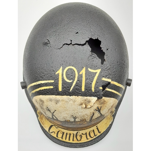 152 - A WW1 German M16 Stahlhelm that was found near Cambrai, France. It has been decorated with a post Wa... 