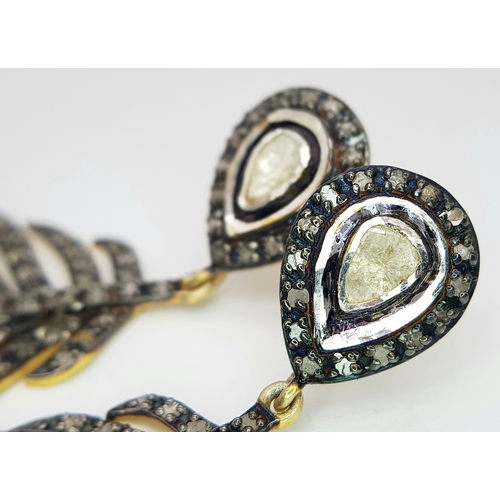 171 - A magnificent, silver and gold pair of earrings with old cut, faceted, natural diamonds (total 2.80 ... 