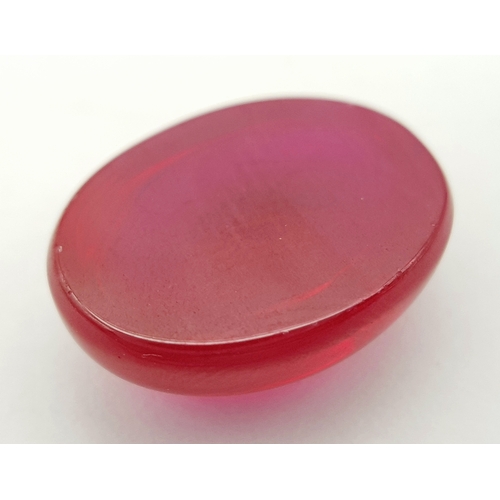 178 - A spectacular STAR RUBY, oval cabochon shaped, lab created, with vivid colour saturation, strong rea... 