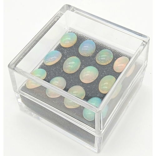 206 - A dozen of top quality, Australian, oval cabochon OPALS, dimensions: 9 x 7 mm, exhibiting excellent ... 