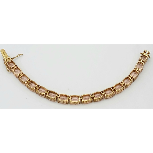 403 - A Yellow Gold Gilt Sterling Silver Morganite Set Tennis Bracelet. 18.5cm Length. Set with Sixteen 9m... 