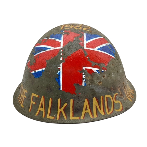 96 - An Original 1980’s British Mk IV Helmet with a hand painted memorial to the 1st Battalion of the Wel... 