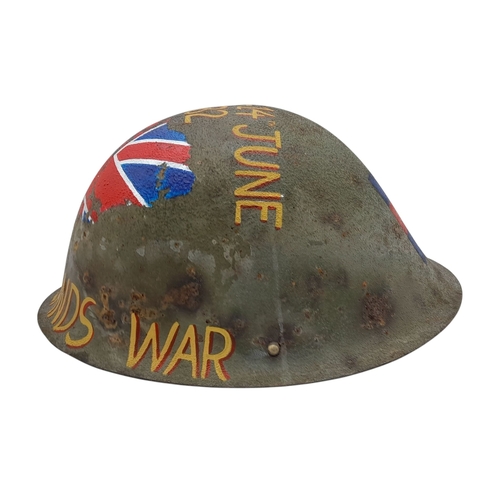 96 - An Original 1980’s British Mk IV Helmet with a hand painted memorial to the 1st Battalion of the Wel... 