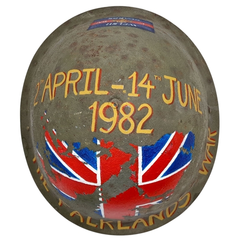 96 - An Original 1980’s British Mk IV Helmet with a hand painted memorial to the 1st Battalion of the Wel... 