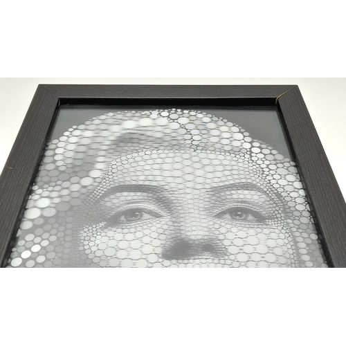 213 - An amazing piece of modern art: A framed, 3D portrait of Marlyn Monroe. This unique method was inven... 