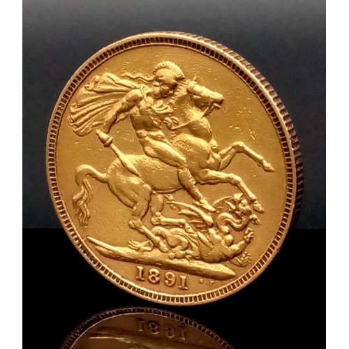 46 - AN 1891 QUEEN VICTORIA REVERESE HORSE LONG TAIL FULL SOVEREIGN COIN. 22K GOLD. C-5014.