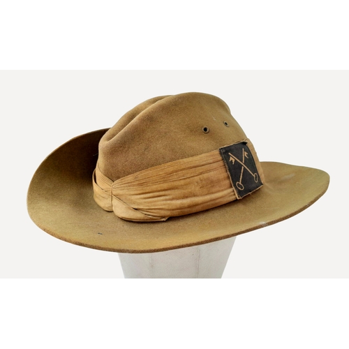 75 - A WW2 British Slouch Hat, With unit flashes of the Royal Artillery and 2nd Infantry Division with so... 