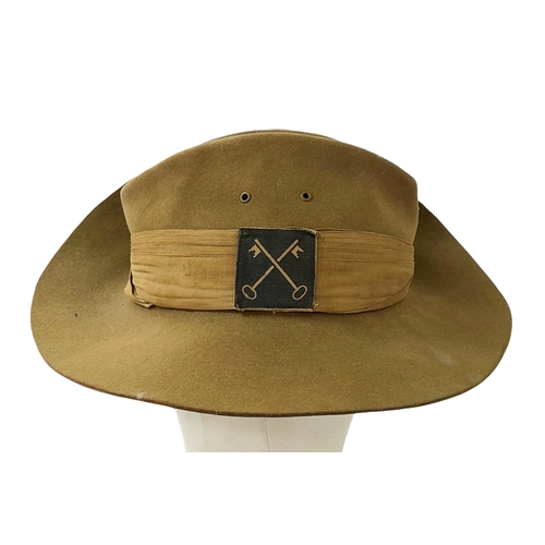 75 - A WW2 British Slouch Hat, With unit flashes of the Royal Artillery and 2nd Infantry Division with so... 