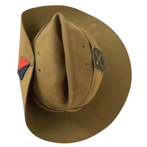 75 - A WW2 British Slouch Hat, With unit flashes of the Royal Artillery and 2nd Infantry Division with so... 