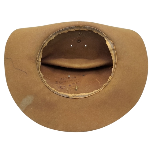 75 - A WW2 British Slouch Hat, With unit flashes of the Royal Artillery and 2nd Infantry Division with so... 