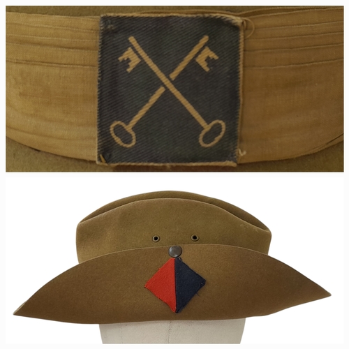 75 - A WW2 British Slouch Hat, With unit flashes of the Royal Artillery and 2nd Infantry Division with so... 