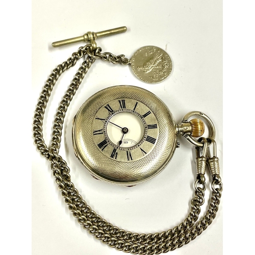 407 - A silver half hunter pocket watch with chain ticks , as found. Ref: Lu33